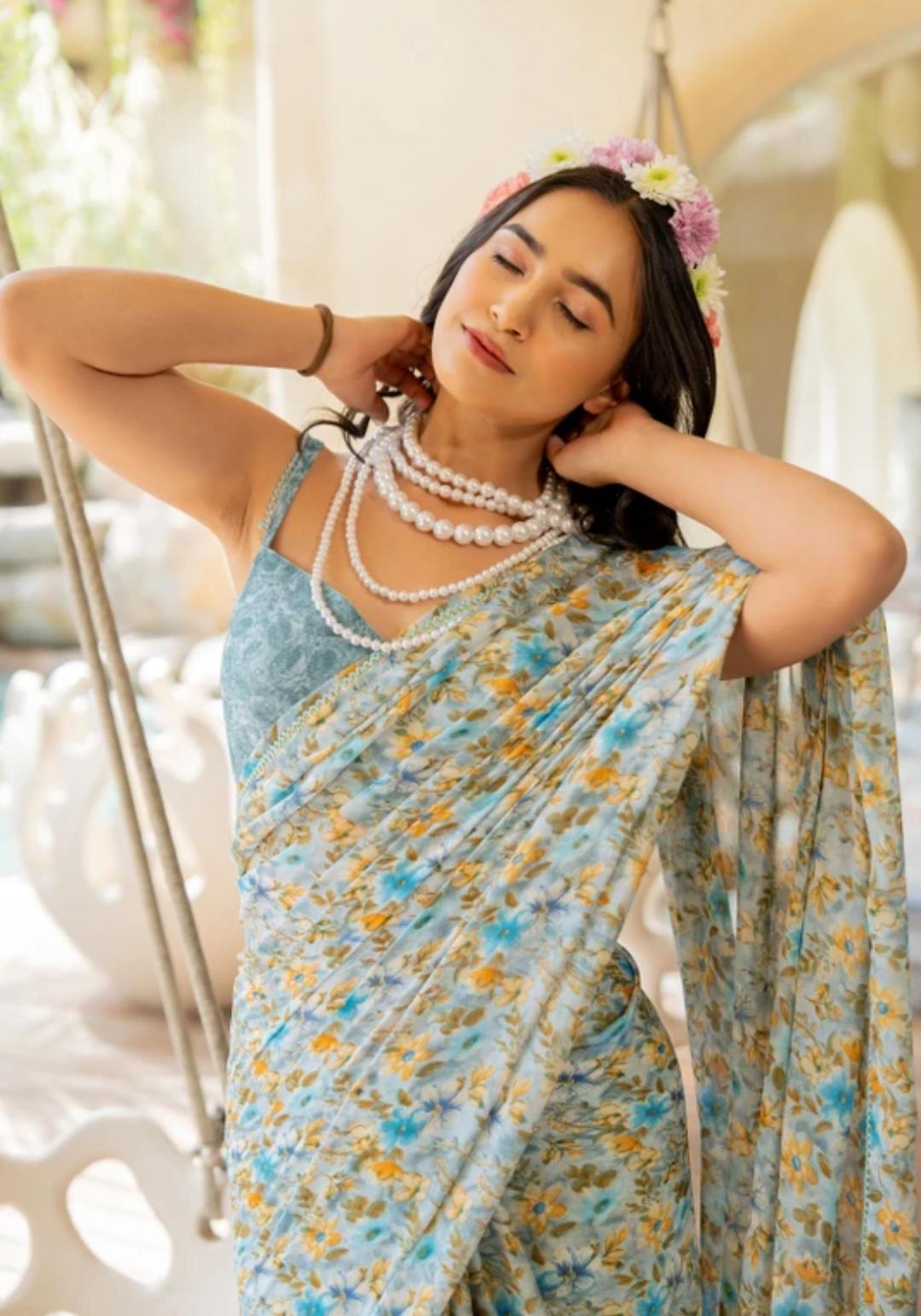 Multicolor Doted White Saari With Sky Blue Blouse